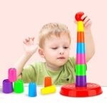 E151 *Funny Ringed Toy* (16×37 cm.) Torre+8 Aros.