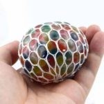 0224-12 *Pelota Hidrogel en Malla con LUZ* (6 cm.)