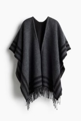 Poncho con borde de flecos