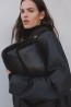 Bolso con borde en pelo sintético