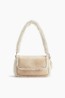 Bolso crossbody con borde de pelo sintético