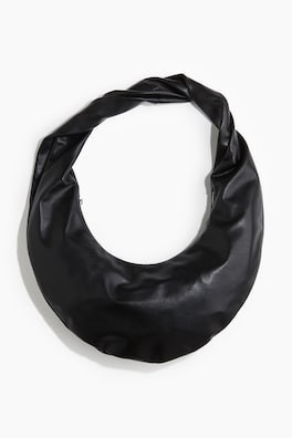 Bolso con correa girada