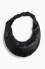 Bolso con correa girada