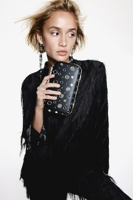 Bolso clutch con decoraciones