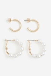 2 Pares de aretes de aro