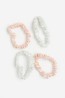 4-pack de scrunchies en seda
